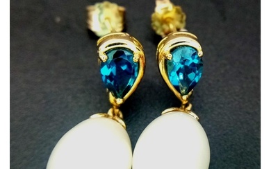 A Pair of White Pearl and London Blue Topaz 9K Gold Drop Ear...