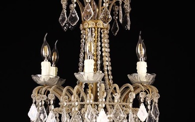 A Pretty Tent & Bag Six Branch Chandelier adorned with strands of cut glass beads. The crown top and