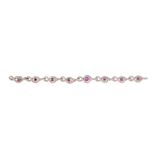A RUBY AND DIAMOND BRACELET, the oval rubies and brilliant c...