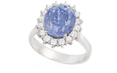 A SAPPHIRE AND DIAMOND CLUSTER RING, composed of...