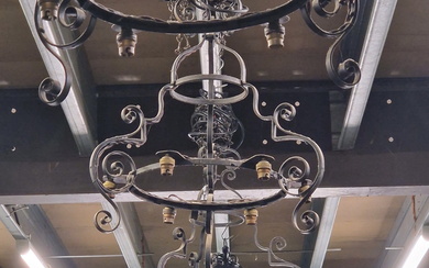 A SET OF SIX ECCLESIASTICAL WROUGHT IRON CHANDELIER LIGHT FITTINGS