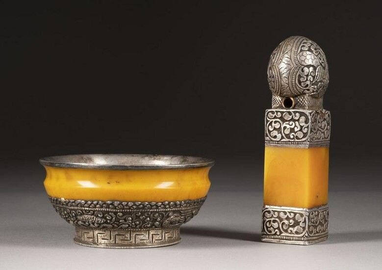 A SILVER-COATED AMBER BOWL AND A STAMP