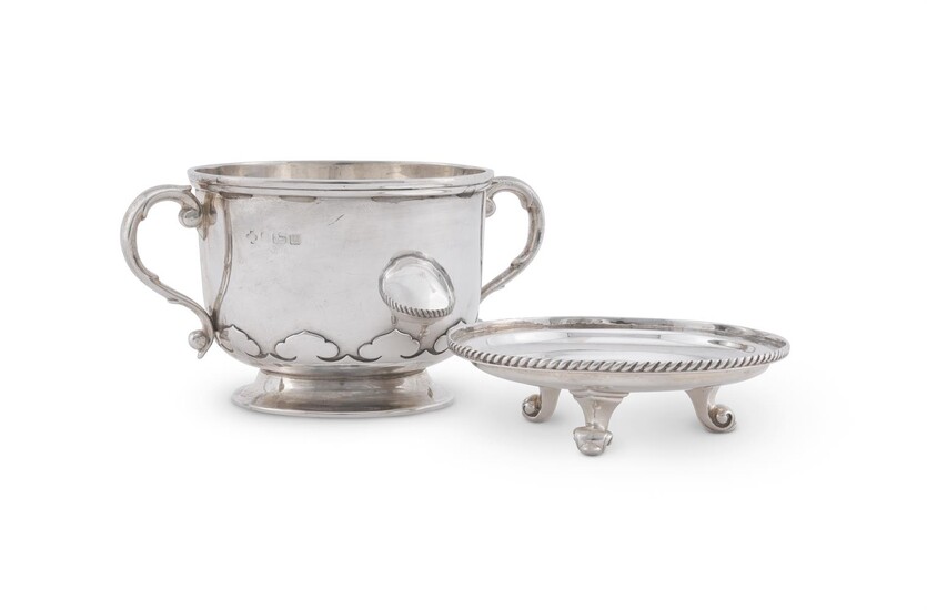 A SILVER TWIN HANDLED CUP AND COVER/STAND IN CHARLES II STYLE, WILLIAM HUTTON & SONS LTD