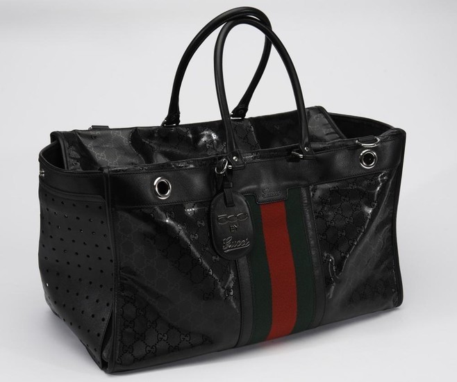 A SPECIAL EDITION PET CARRIER BY GUCCI