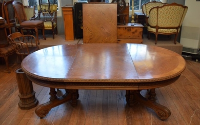 A SUBSTANTIAL TIMBER EXTENSION TABLE WITH DECORATIVE CARVED DETAILING (77H x 215W 139D CM)
