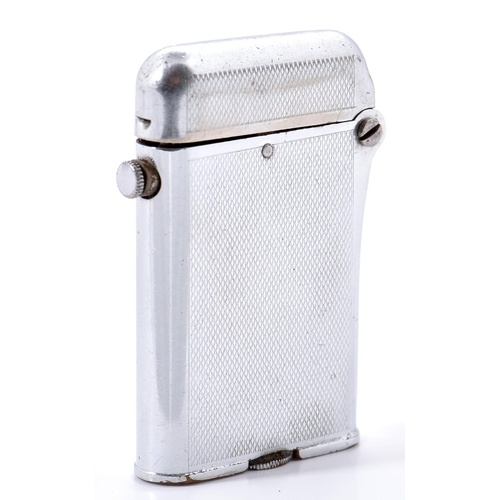 A Thorens stainless steel cigarette lighter, marked BRIT PAT...