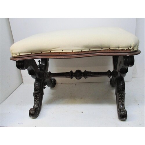 A Victorian mahogany x frame stool, the shaped top upholster...
