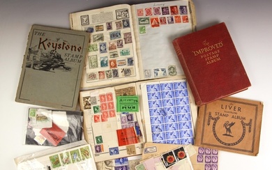 A World stamp collection in a number of small albums and pac...