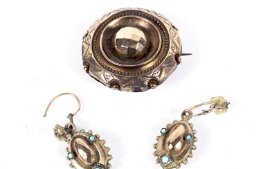 A brooch and a pair of earrings. Comprising a Victorian gold round memorial brooch with glazed hair back-panel, and a pair of gold-plated and turquoise pendent earrings. 9.7g gross