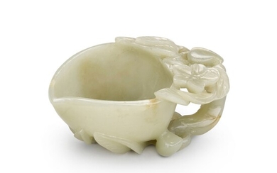 A celadon jade 'peach' cup, Qing dynasty, 19th century | 清十九世紀 青玉桃式盃