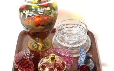A collection of mostly cranberry glasswares to include a gilt...