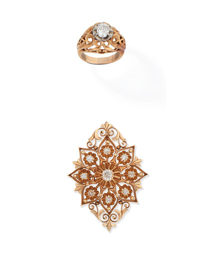 A diamond ring and a diamond pendant/brooch