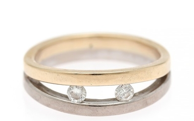 A diamond ring set with two brilliant-cut diamonds, mounted in 14k gold and white gold. Size app. 56.5.
