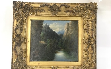 A gilt framed oil painting on canvas study of a river and mo...