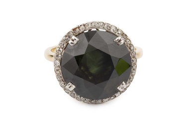 A green stone and diamond set dress ring, the circular...