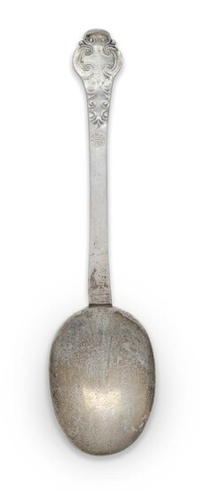 A lace-back silver trefid spoon, unmarked, the reverse of bowl and front of terminal with foliate scroll decoration, the front of the stem later scratch engraved 'J Francis' and the reverse of the terminal prick dot engraved with the initials R...
