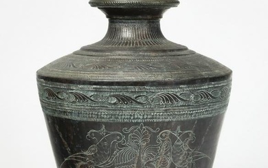A large Asian metal ware vessel
