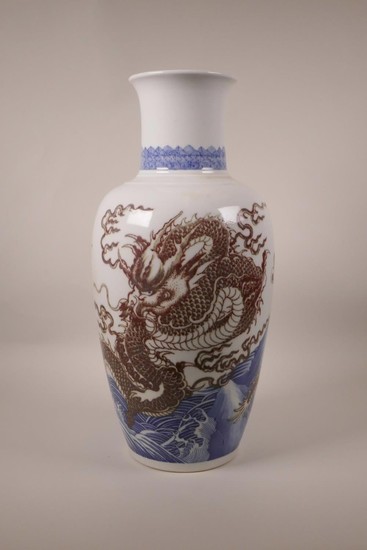 A large Chinese blue and white porcelain vase decorated with...