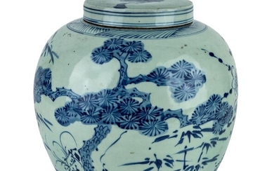 A large Chinese blue and white 'three friends of winter' jar and cover, 19th century, raised on a short foot to rounded shoulders and unglazed rim, painted with pinetree, bamboo and prunus to the exterior, a leafy branch to the top of the cover...