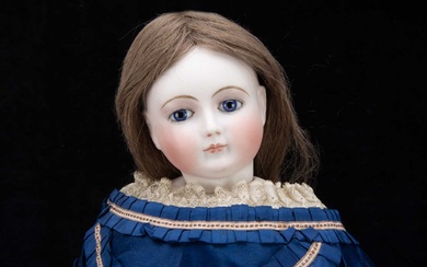 A large late 19th century French pressed bisque swivel-head fashionable doll