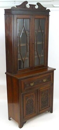 A late 19thC / early 20thC mahogany secretaire bookcase