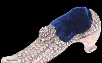 A late Victorian novelty silver lady's shoe pin cushion, Adi...