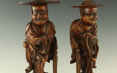 A pair of Chinese root carved figures, 2
