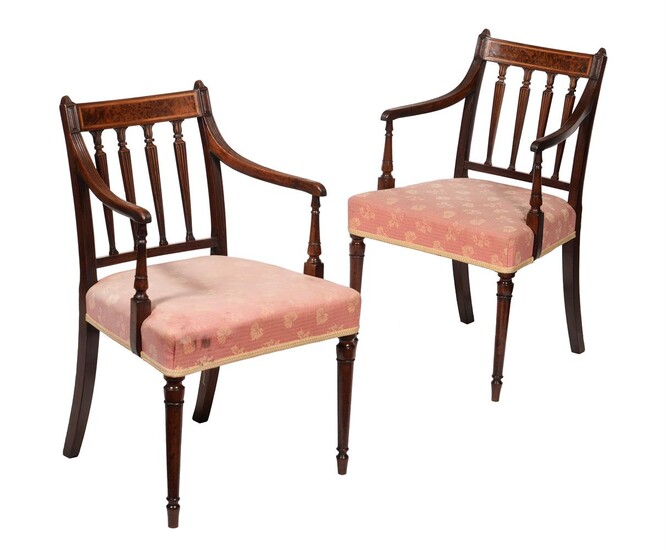 A pair of George III mahogany armchairs