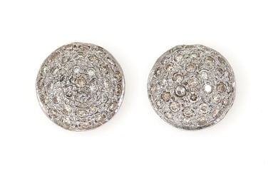 A pair of diamond ear studs each set with numerous single-cut diamonds,...