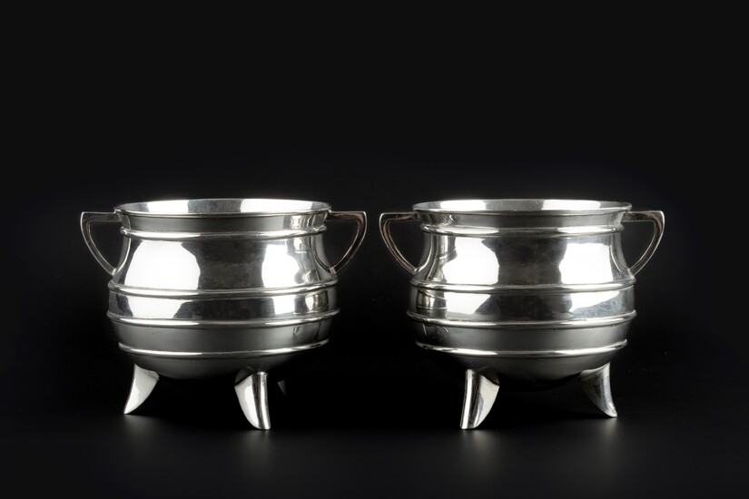 A pair of late Victorian silver twin handled bowls in...