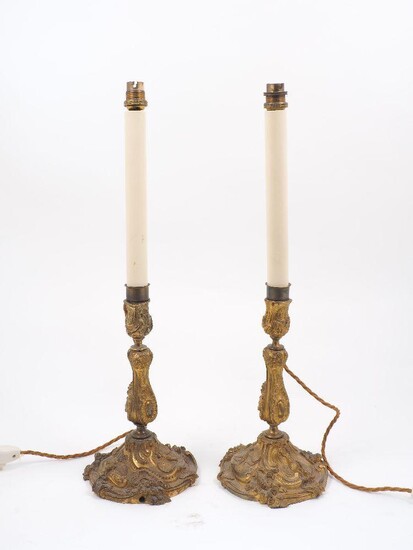 A pair of ormolu candlestick lamps, late 19th century, of...