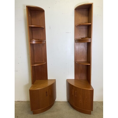 A pair of teak mid century G Plan two piece corner shelves w...