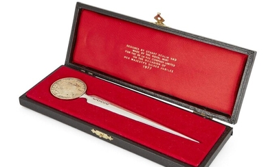 A parcel gilt silver letter opener by Stuart Devlin, London, 1977, in signed, fitted case, the letter opener commemorating the Queen's Silver Jubilee, 17.2cm long