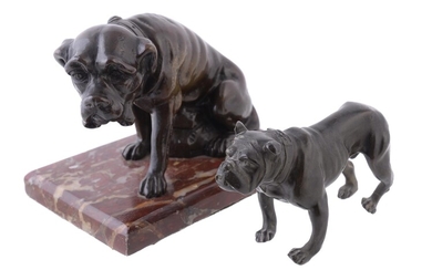 A patinated bronze model of a seated mastiff