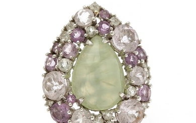 NOT SOLD. A prehnite and diamond ring set with a pear shaped prehnite encircled by...