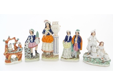 A quantity of Staffordshire pottery figures to include a gir...