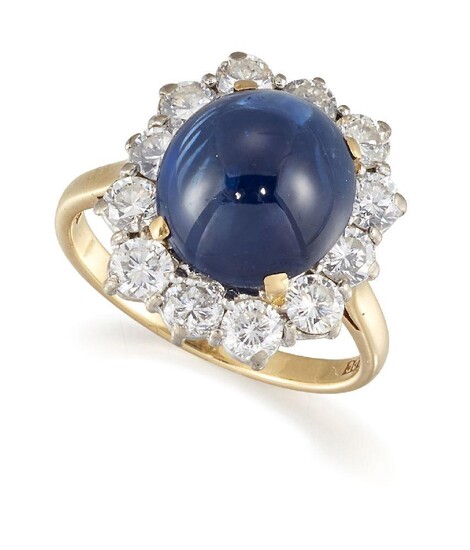 A sapphire and diamond cluster ring, the single claw-set cabochon...