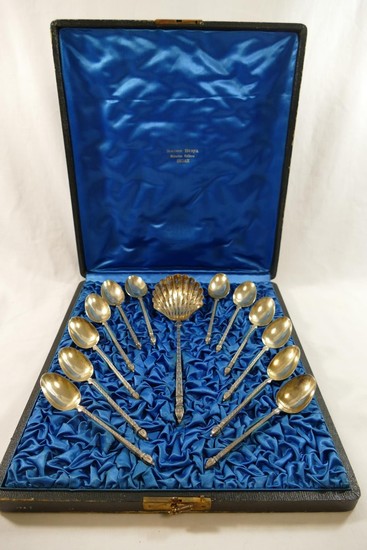 A set of 12 French silver teaspoons and a large sifter spoon...