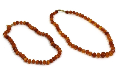 A single row uniform butterscotch amber bead string