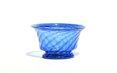 A small blue glass bowl c.1800, spiral moulded with a...