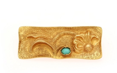 A turquise brooch set with a turquise cabochon, mounted in 18k gold. 1.7×4 cm.