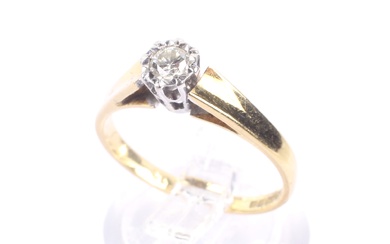 A vintage 18ct gold and diamond solitaire illusion ring. The round brilliat approx. 0.