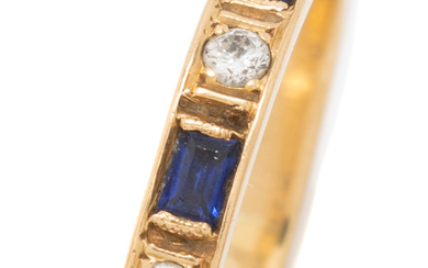 AN 18CT GOLD SAPPHIRE AND DIAMOND RING; gypsy set with...