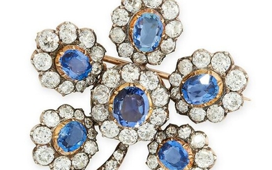 AN ANTIQUE SAPPHIRE AND DIAMOND FLOWER BROOCH in yellow