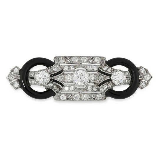 AN ART DECO ONYX AND DIAMOND BROOCH in 18ct white gold