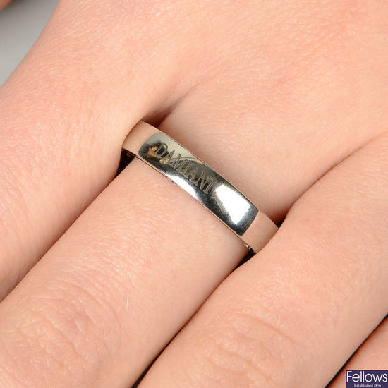 An 18ct gold diamond band ring, designed by Damiani and Brad Pitt.