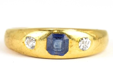 An 18ct gold ring set with flush fit cut square...