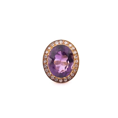 An 18ct yellow gold, diamond, and amethyst cocktail ring, se...