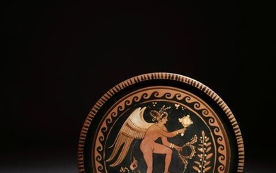 An Apulian Red-Figured Plate with Eros Diameter 9
