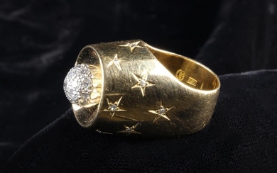 An Unusual 1960's 18 Carat Gold Ring of jet engine design, set with a diamond encrusted ball within
